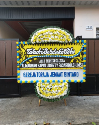 Papan Bunga Duka di Mam